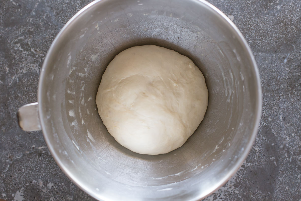 Fresh Buttery Garlic Breadsticks dough in mixer bowl.