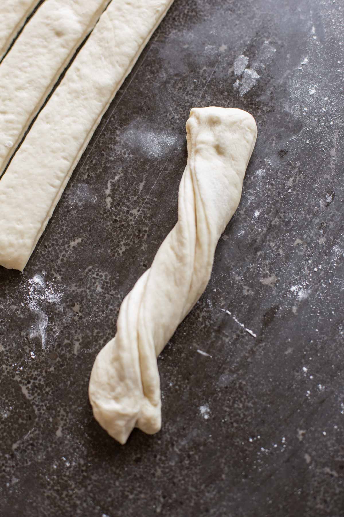 Fresh Buttery Garlic Breadsticks dough twisted.