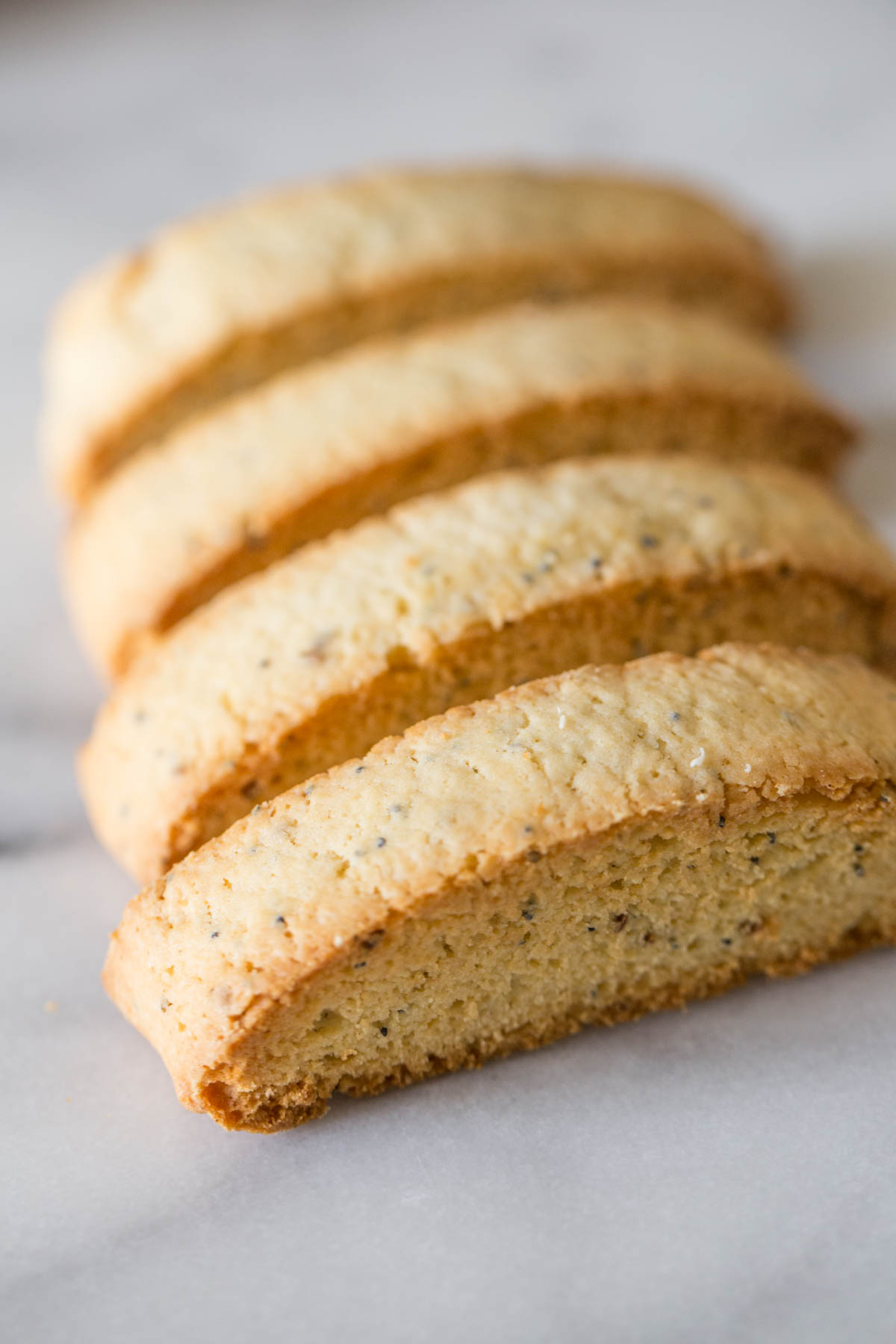 Four Almond Poppy Seed Biscotti slices without the white chocolate dip. 