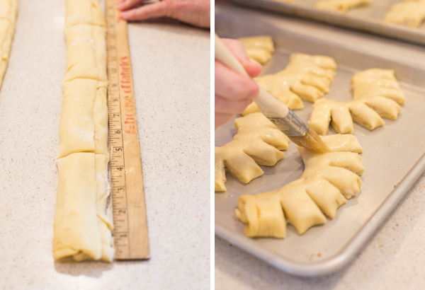 Two step by step pictures for the Buttery Almond Bear Claws - the first showing the filled strips being cut into 4 1/2 inch long segments, and the second showing the Bear Claws on a baking sheet being brushed with eggs whites. 
