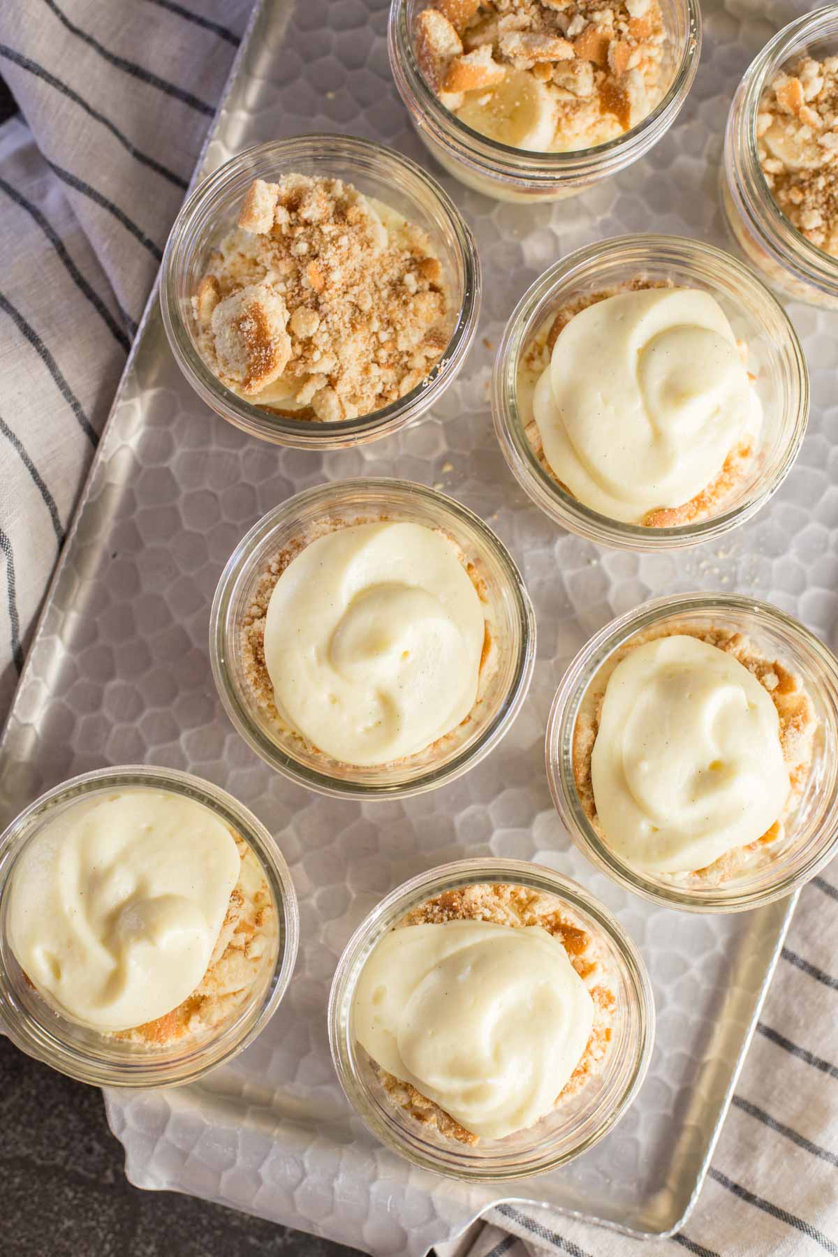 In process shot from above showing layers of banana pudding cups