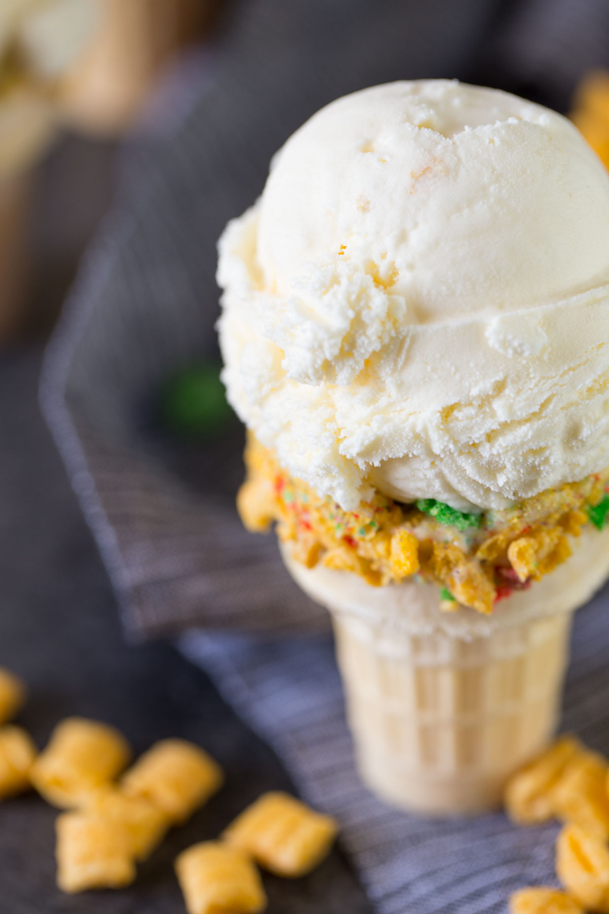 Homemade Cereal Milk Ice Cream in a cone. 