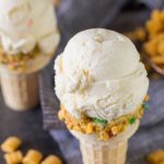 Homemade Cereal Milk Ice Cream in a cone.