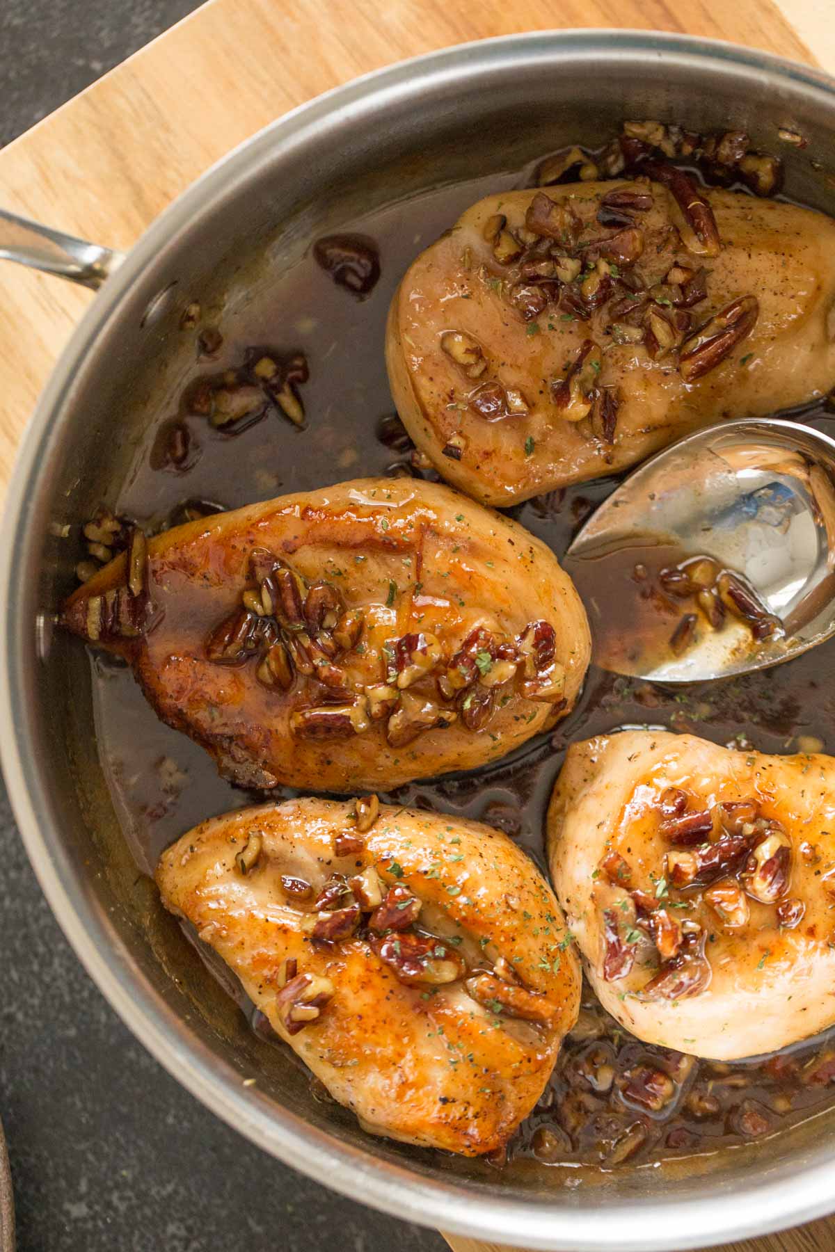 Overhead view of Butter Pecan Chicken in a skillet. 