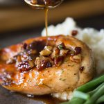 Sweet glaze spooned over Butter Pecan Chicken.