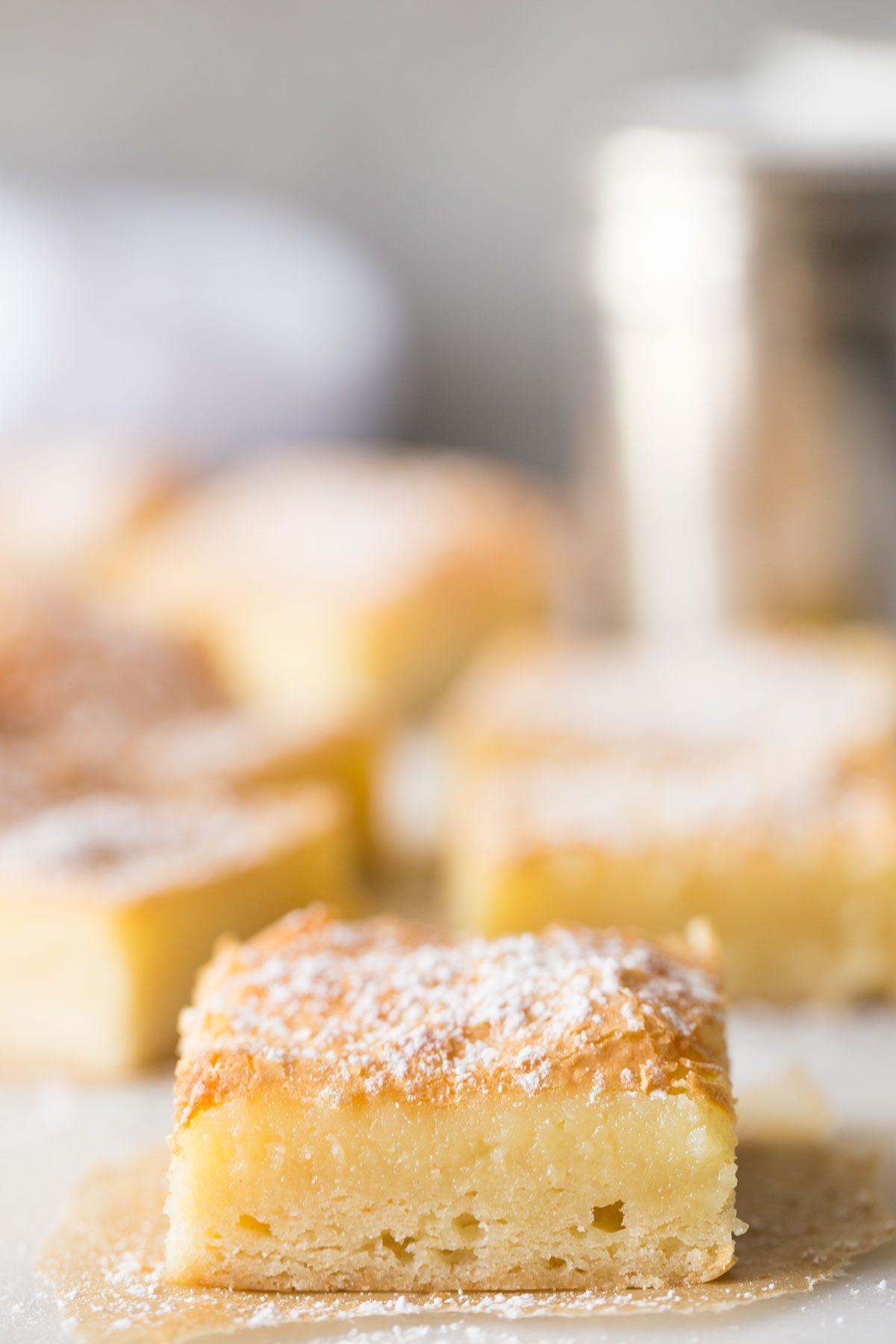 Close up view of three distinct layers of Gooey Butter Bars. 