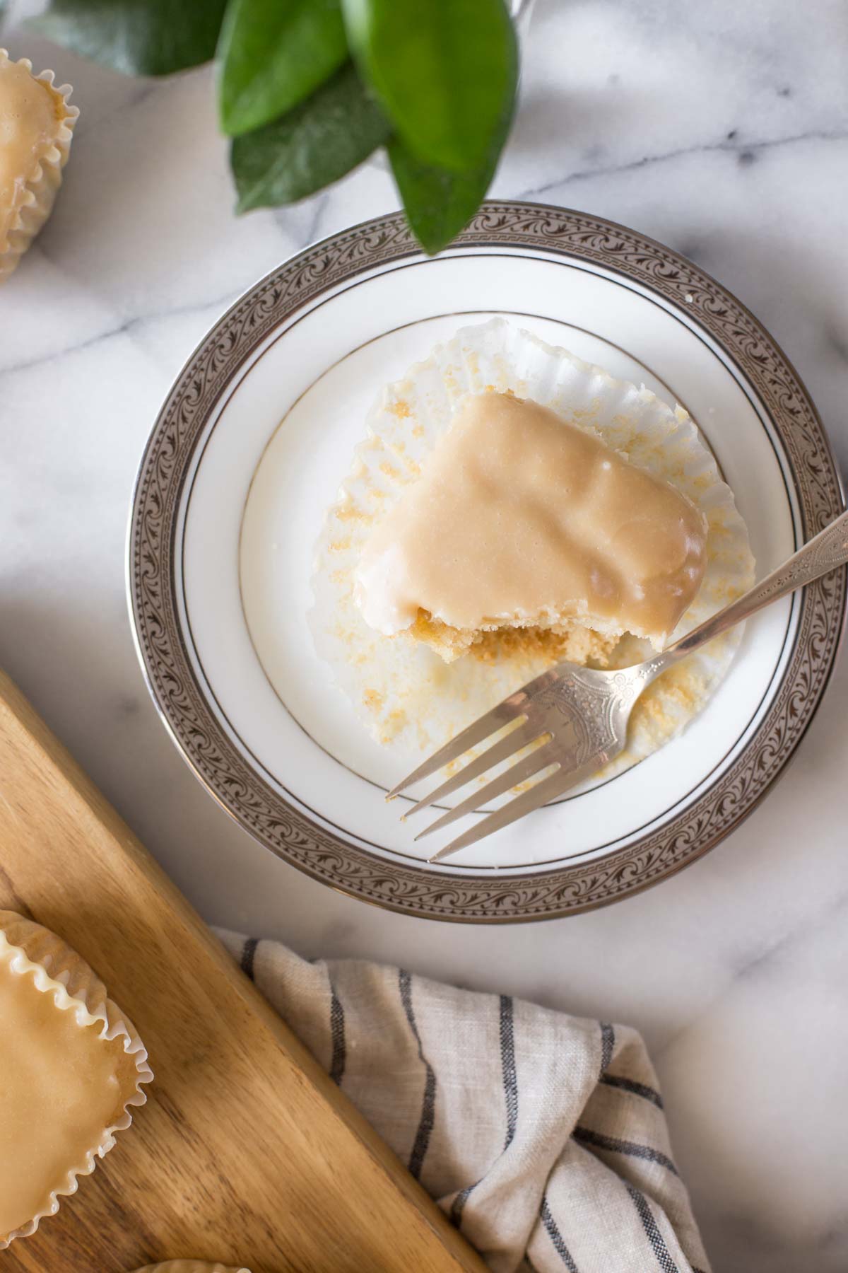 An overhead view of a copycat version of Martino's Bakery Tea Cakes on a white plate. 