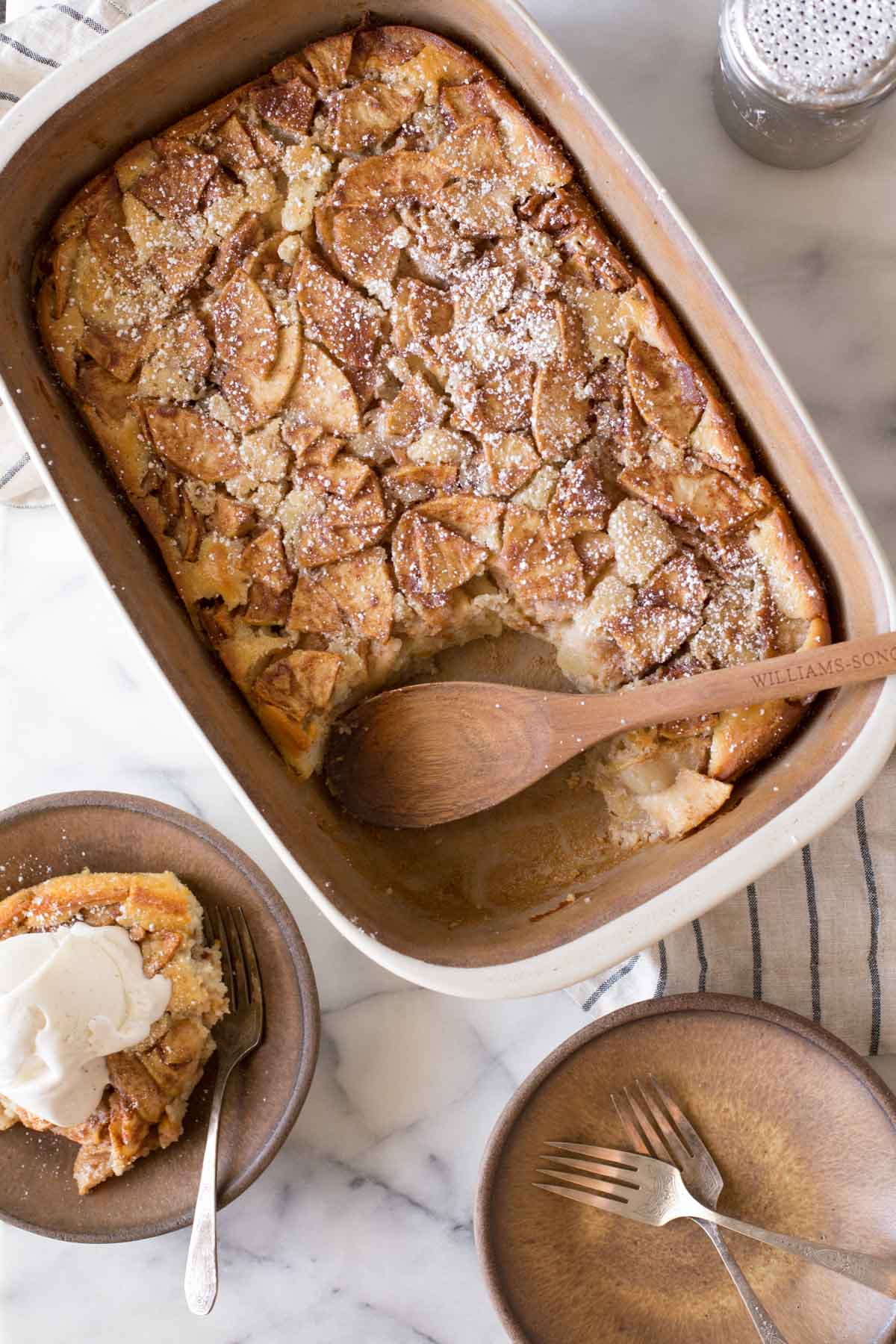 Overhead view of Apple Cobbler on a marble background. 