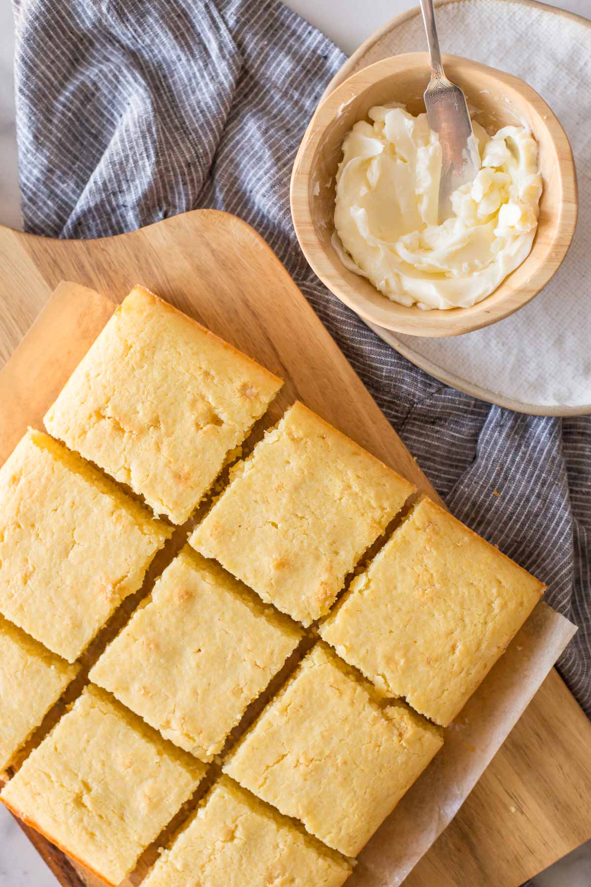 Overhead view of Easy Homemade Cornbread cut into bars. 