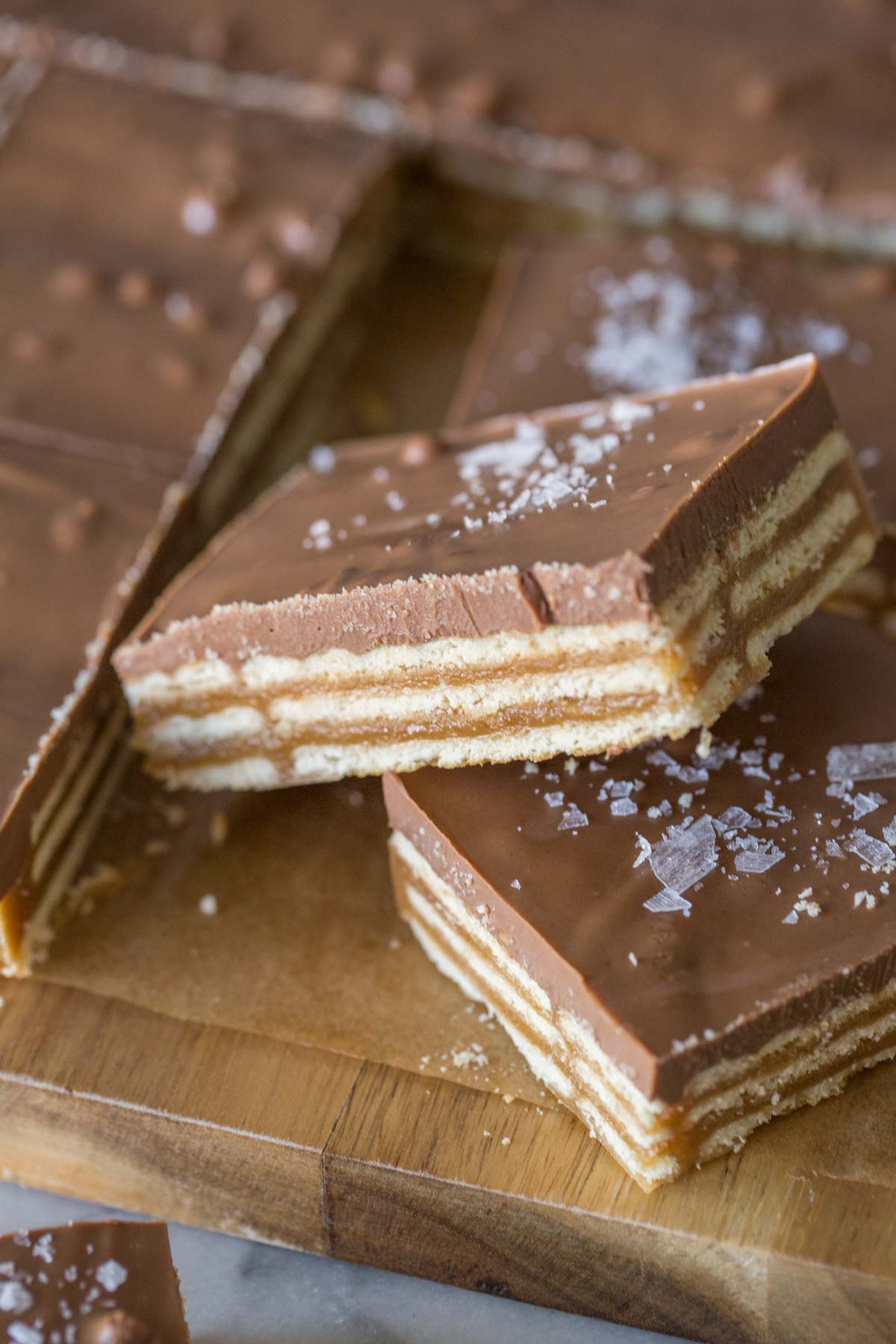 Close up shot of caramel, cracker, and chocolate layers of Salt River Bars. 