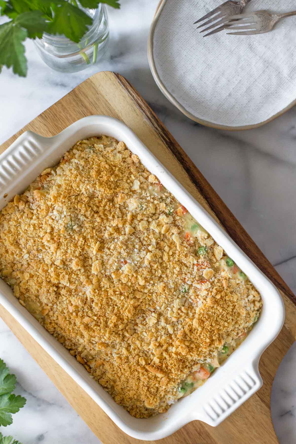 Overhead view of Creamy Chicken and Rice Bake in a white casserole dish. 