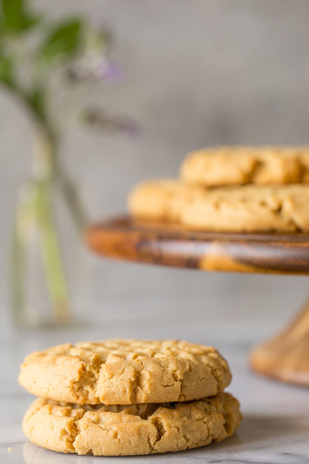 A small stack of Soft and Chewy Peanut Butter Cookies. 
