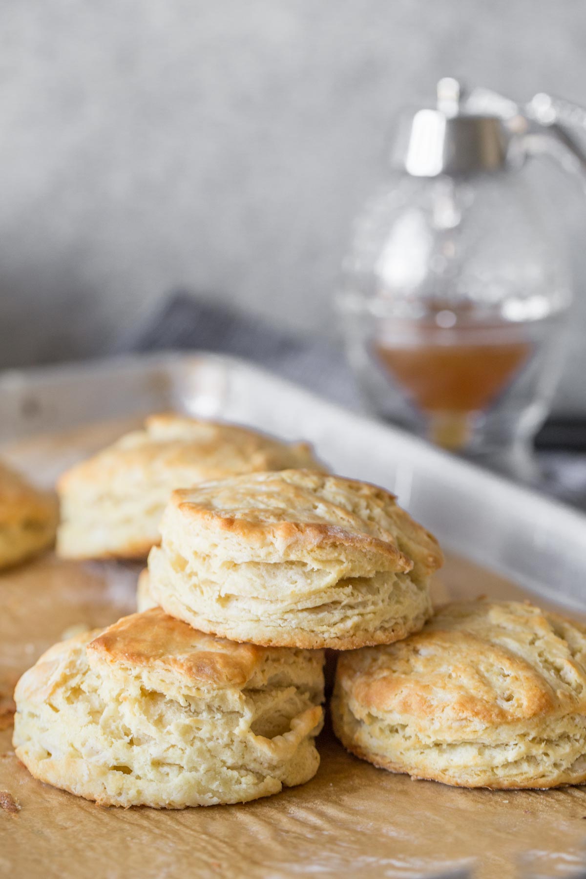 Easy Homemade Biscuits on a parchment lined baking sheet. 
