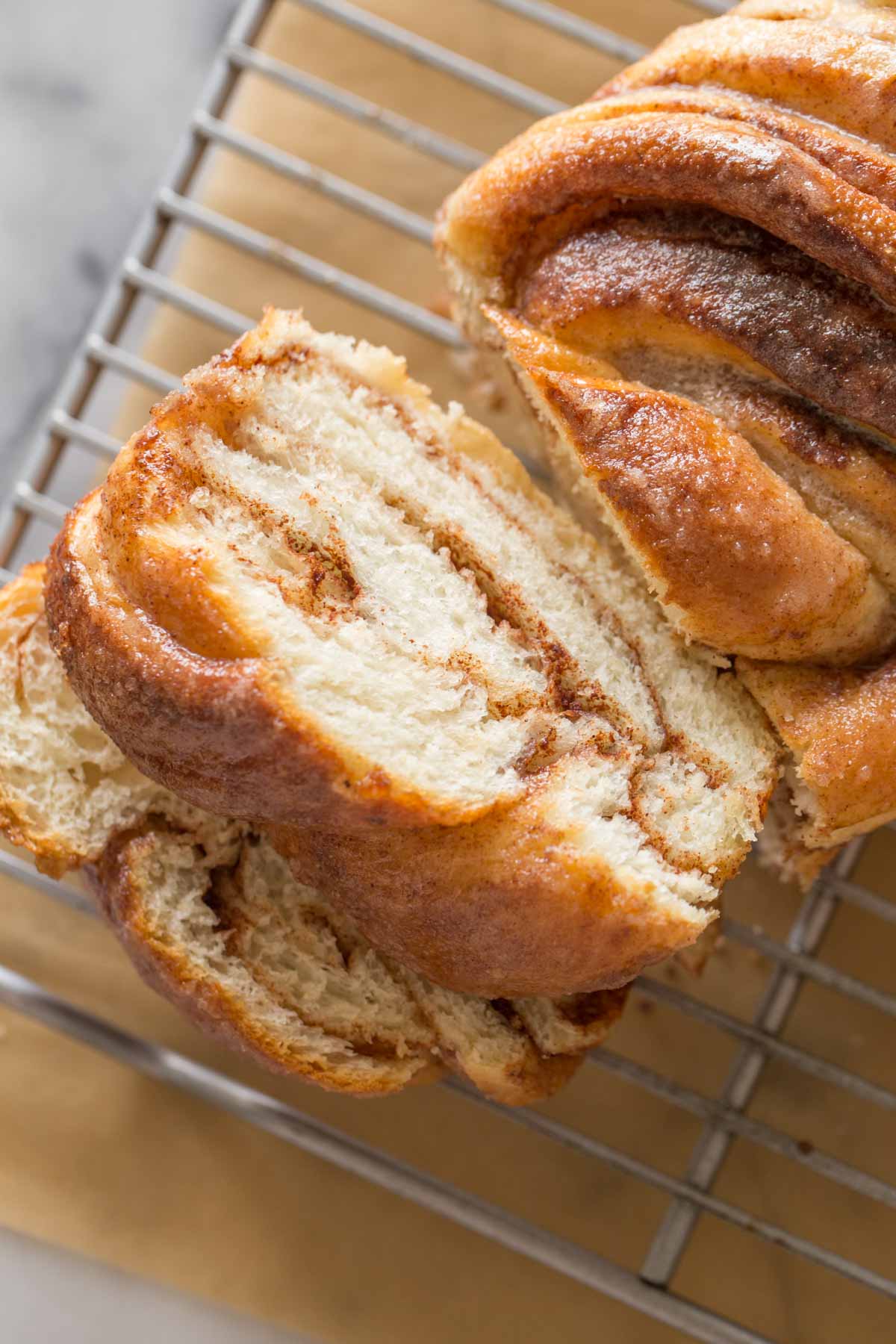 Overhead shot of a loaf of Cinnamon Twist Bread that has been sliced.  