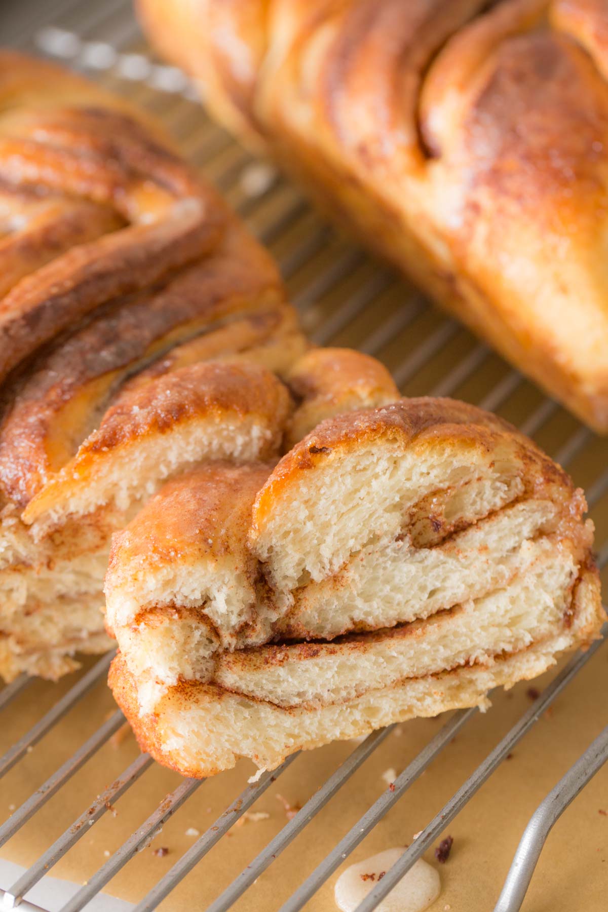 Close up shot of a slice of Cinnamon Twist Bread, showing the ribbons of cinnamon and sugar.  