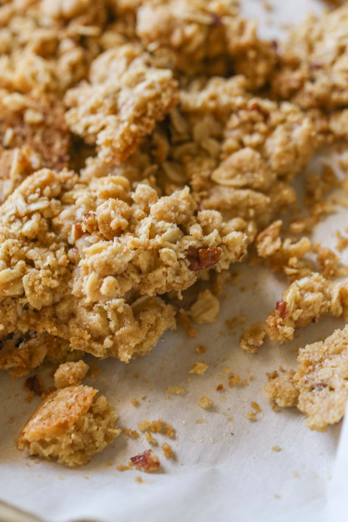 Close up shot of the buttery oat crisp after its been broken into small pieces. 